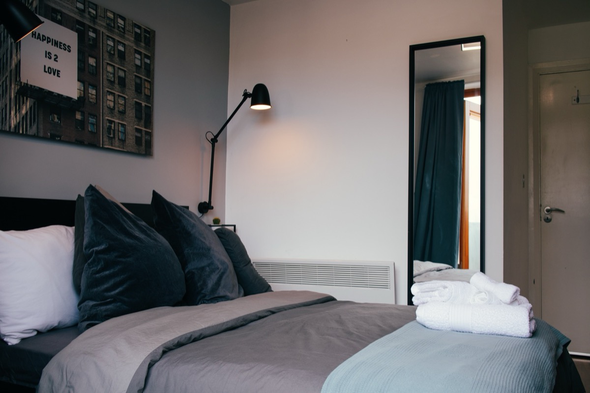 Main bedroom after: finished room ready for guests